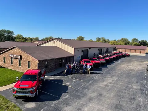 The Smillie Mechanical team and service fleet in Freeland, Michigan